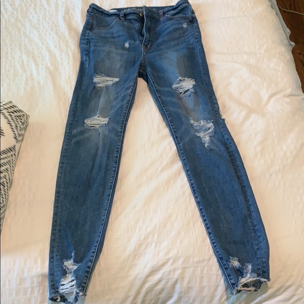 medium wash highest rise jegging distressed jeans